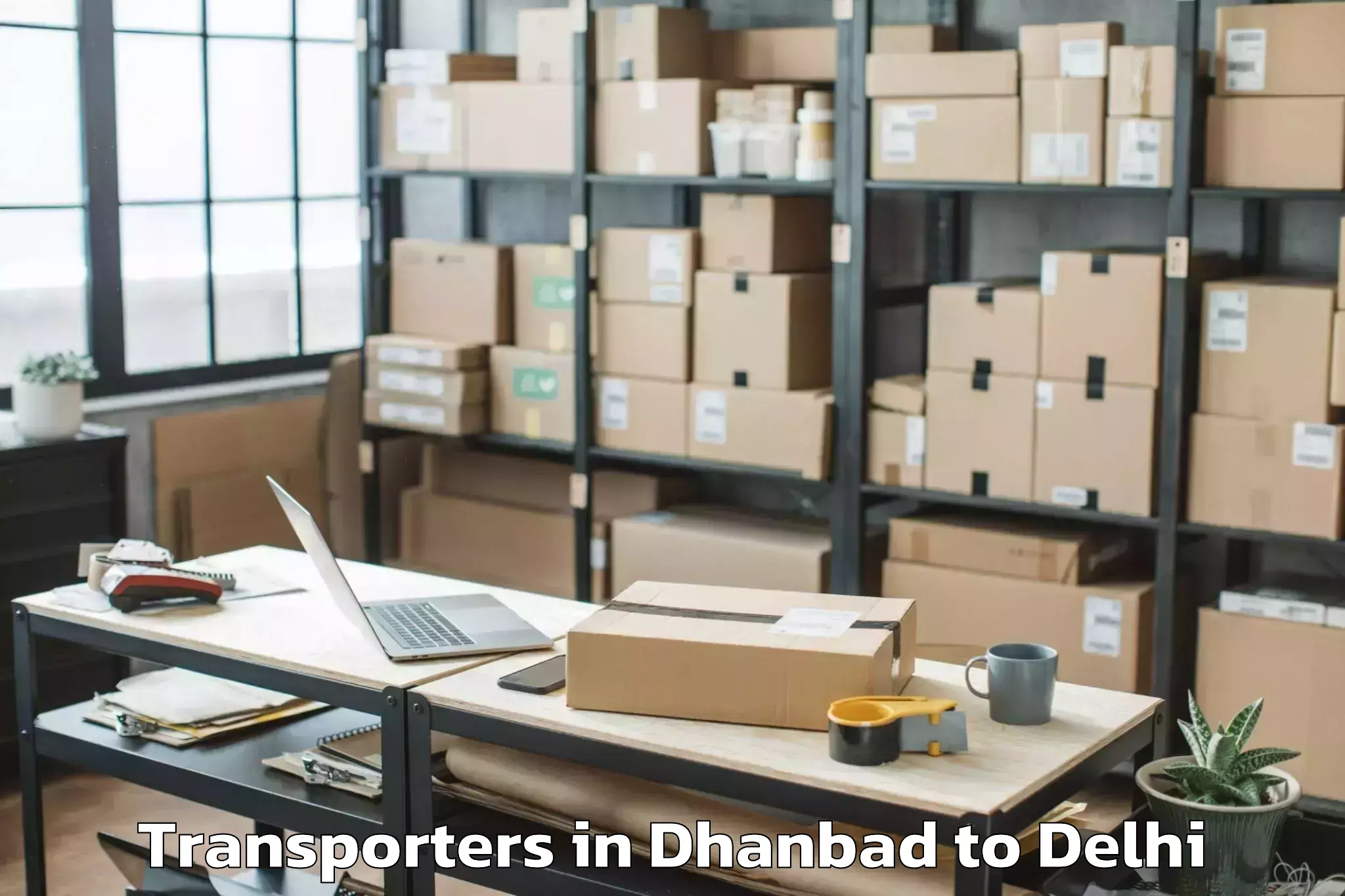 Book Dhanbad to Ambience Mall Rohini Transporters